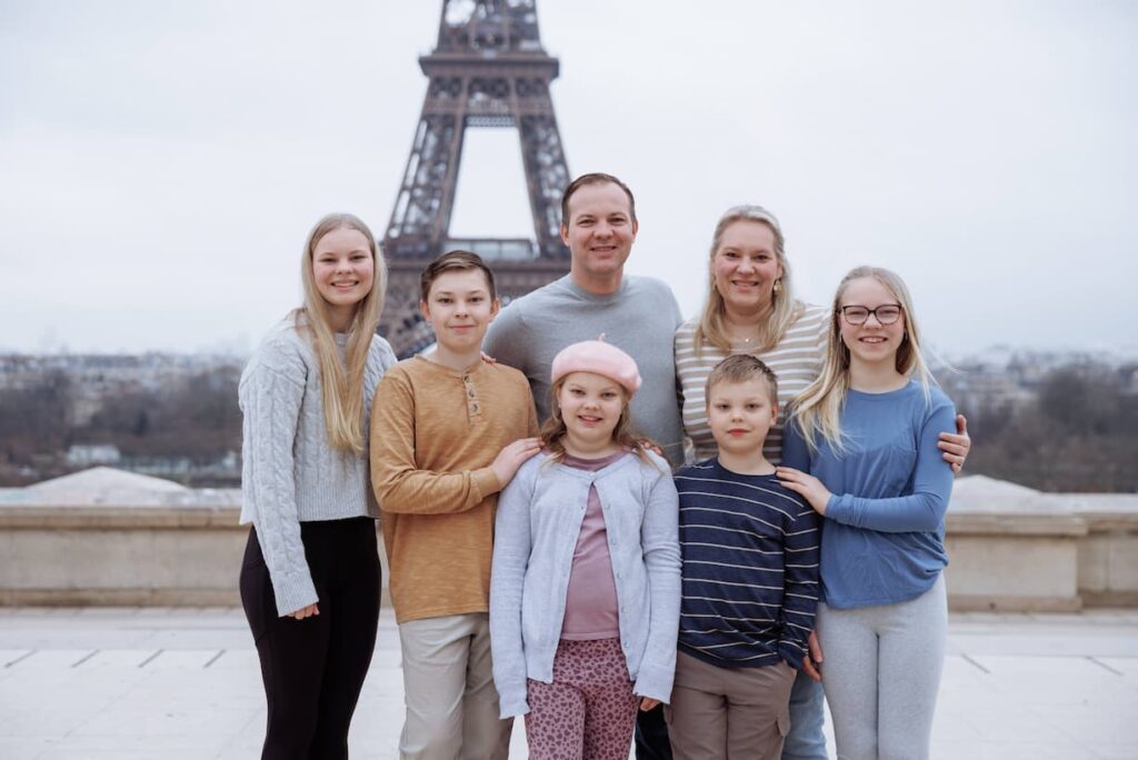 The Sowash Family in Paris, France in front of the Eiffel tower. 